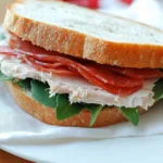 low sodium lunch meat 5 Delicious low sodium lunch meat slices arranged on a wooden board, perfect for a healthy sandwich option.