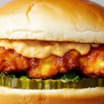 Copycat Dave's Hot Chicken Cauliflower Sliders 5 Copycat Dave's Hot Chicken Cauliflower Sliders, spicy vegan sliders with crispy cauliflower, topped with slaw and sauce, served on soft buns.