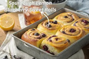 Freshly baked sourdough lemon blueberry sweet rolls in a rustic kitchen