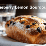 Blueberry Lemon Sourdough loaf with rustic crust and bright lemon zest topping