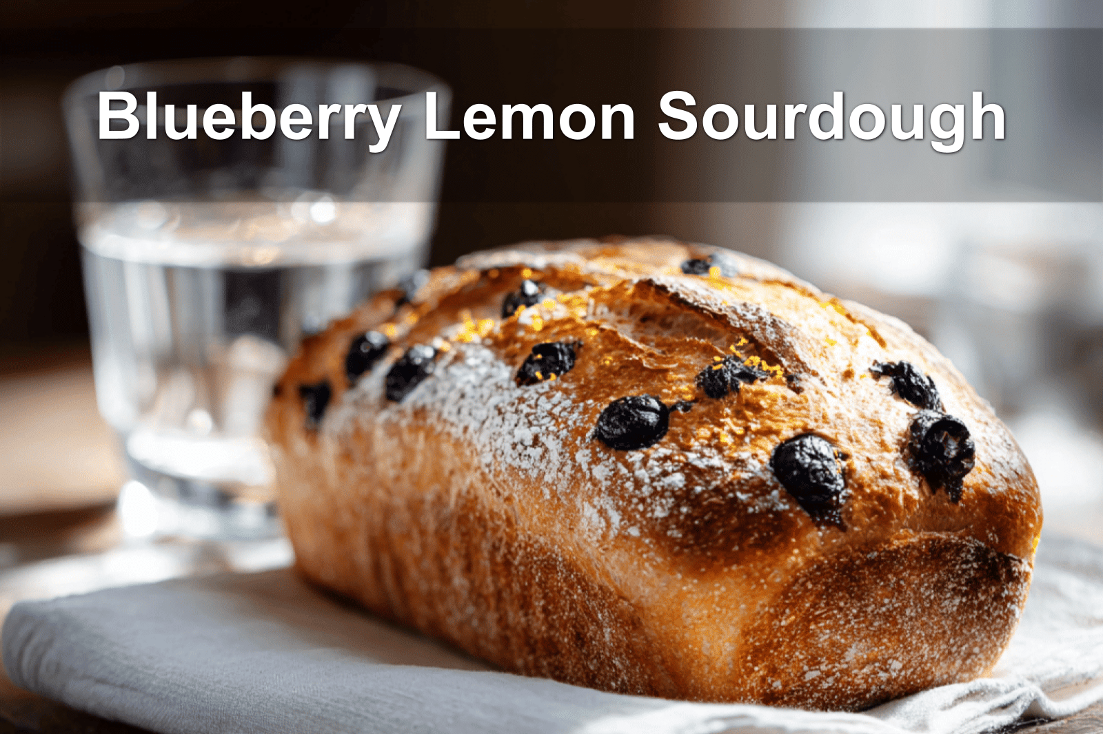 Blueberry Lemon Sourdough loaf with rustic crust and bright lemon zest topping