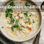 Creamy Chicken and Rice Soup served in warm, natural lighting on a cozy white table setup