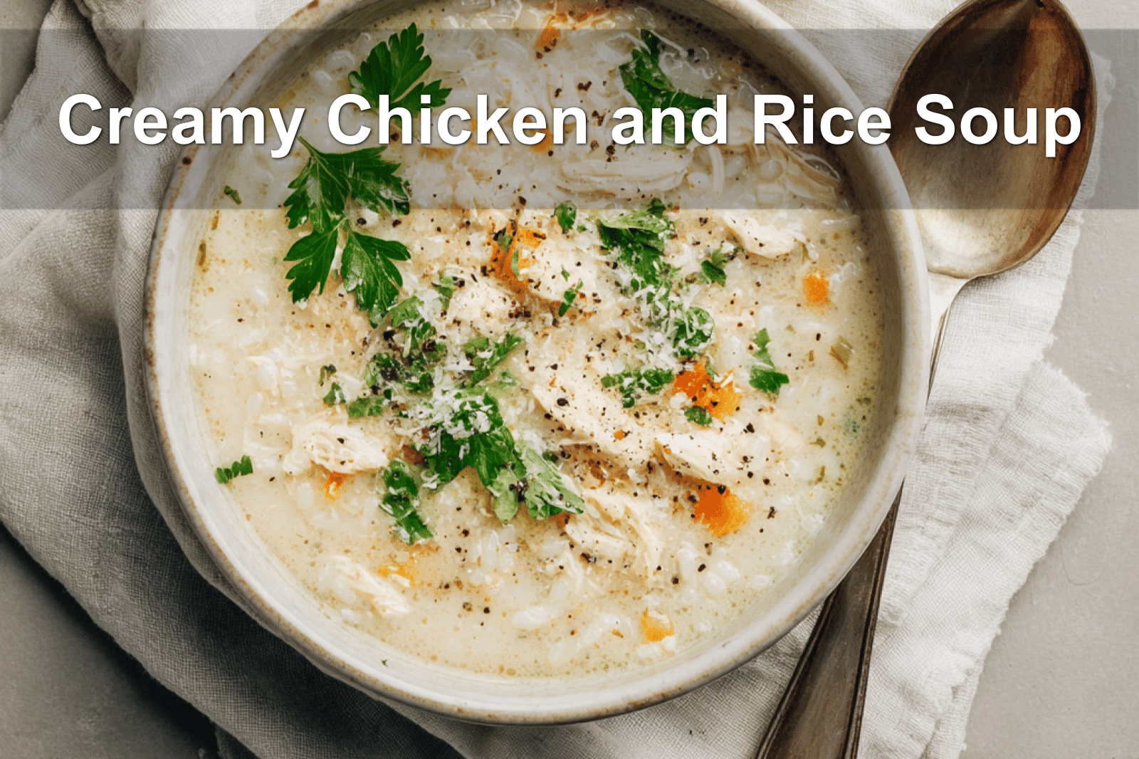 Creamy Chicken and Rice Soup served in warm, natural lighting on a cozy white table setup