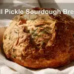 Dill Pickle Sourdough Bread showcased with natural lighting and minimal setup