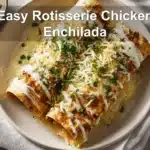 Easy Rotisserie Chicken Enchilada beautifully presented with toppings and soft colors