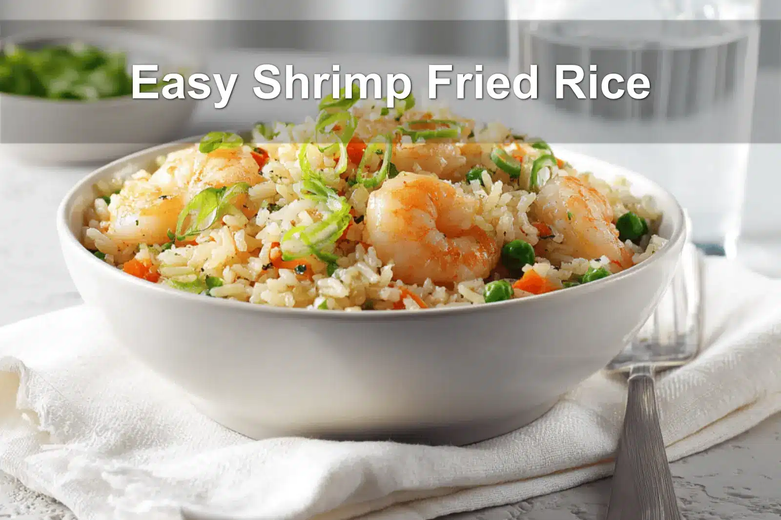 Easy Shrimp Fried Rice plated on white napkin with glass of water warm natural light