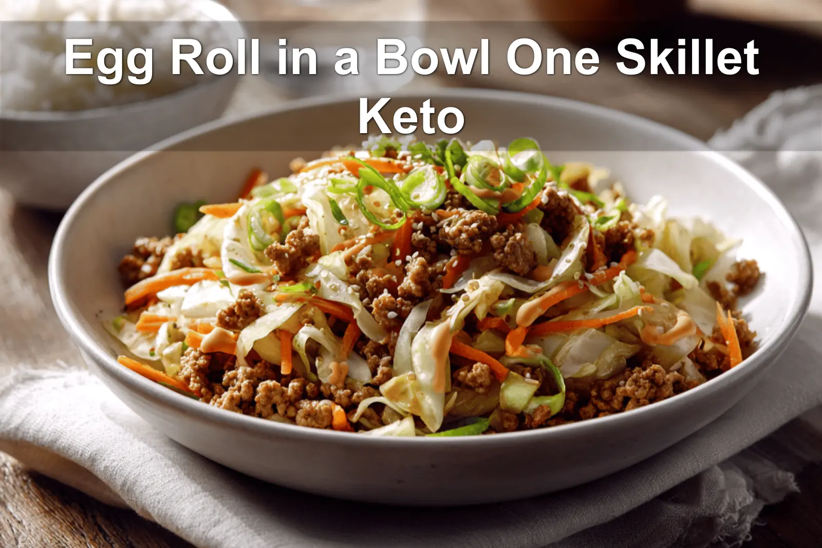 Egg Roll in a Bowl One Skillet Keto aromatic turkey cabbage bowl with sriracha mayo drizzle and sesame