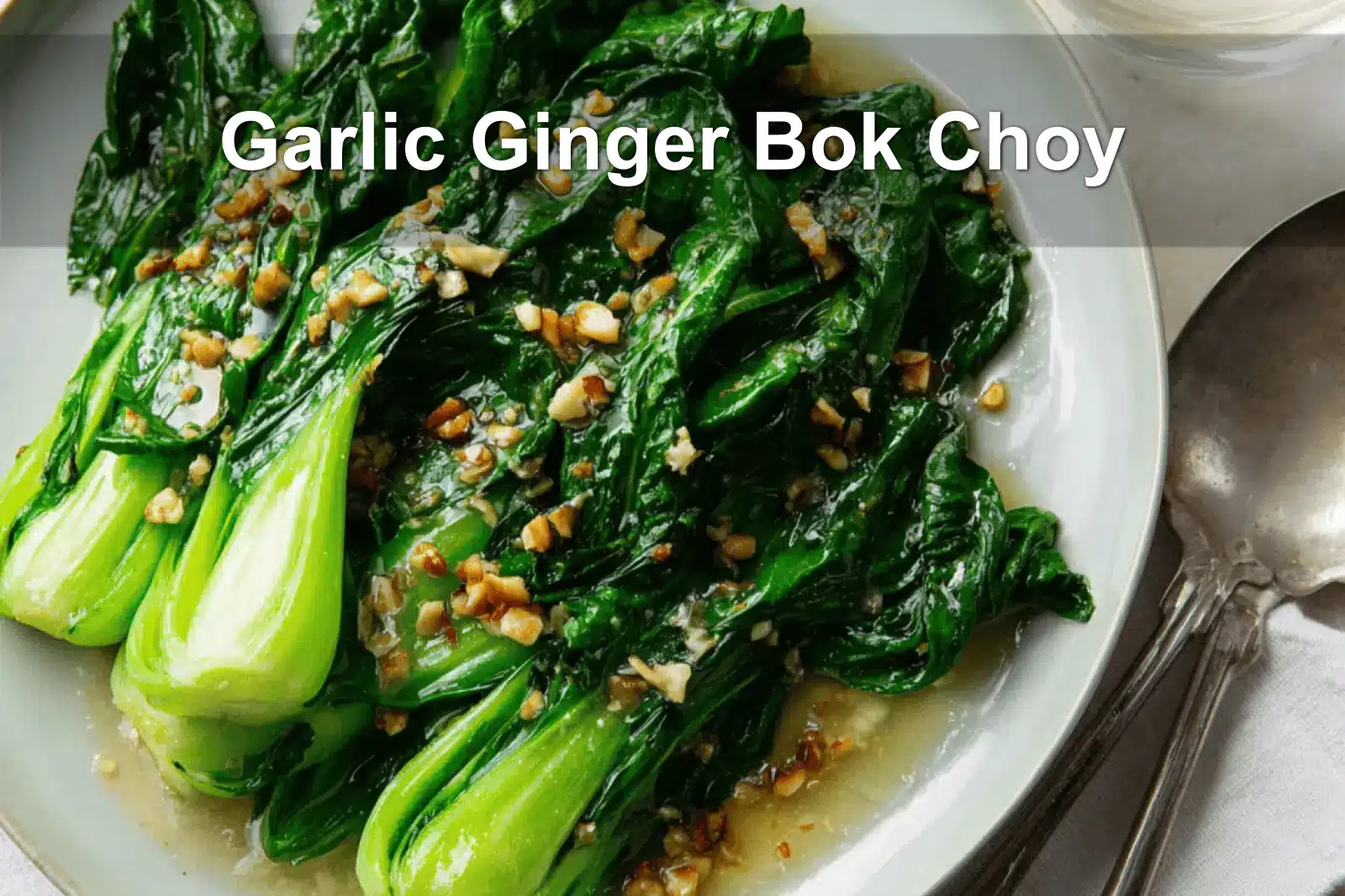 Garlic Ginger Bok Choy plated with vibrant greens, warm tones, and soft natural lighting.