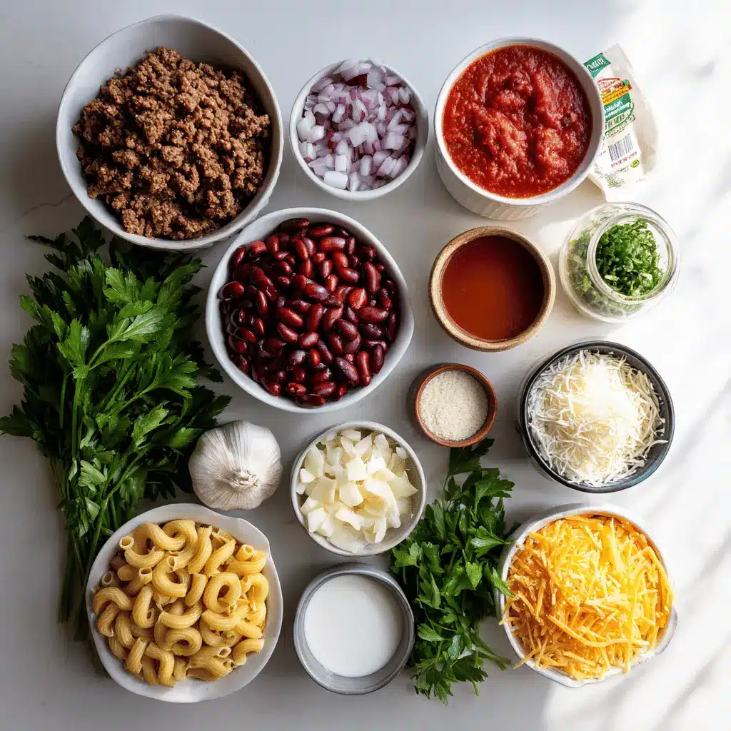 Chili Mac Recipe: Easy, Comforting One-Pot Dinner 3 Chili Mac Recipe featuring gooey cheese, hearty chili, and macaroni in a comforting one-pot dinner.