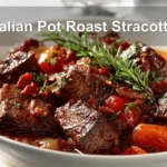 Italian Pot Roast Stracotto in rustic bowl on white cloth napkin with glass of water