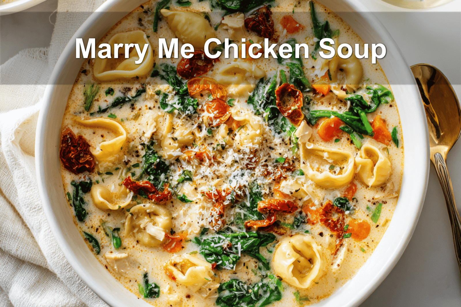 Marry Me Chicken Soup in a white bowl, warm and inviting with vibrant ingredients.