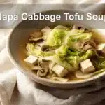 Napa Cabbage Tofu Soup bowl with tender tofu napa cabbage mushrooms and warm savory broth