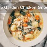 Warm bowl of Olive Garden Chicken Gnocchi Soup with gnocchi, spinach, and chicken in rich broth