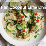 One Pan Coconut Lime Chicken plated with fresh garnishes and a creamy sauce