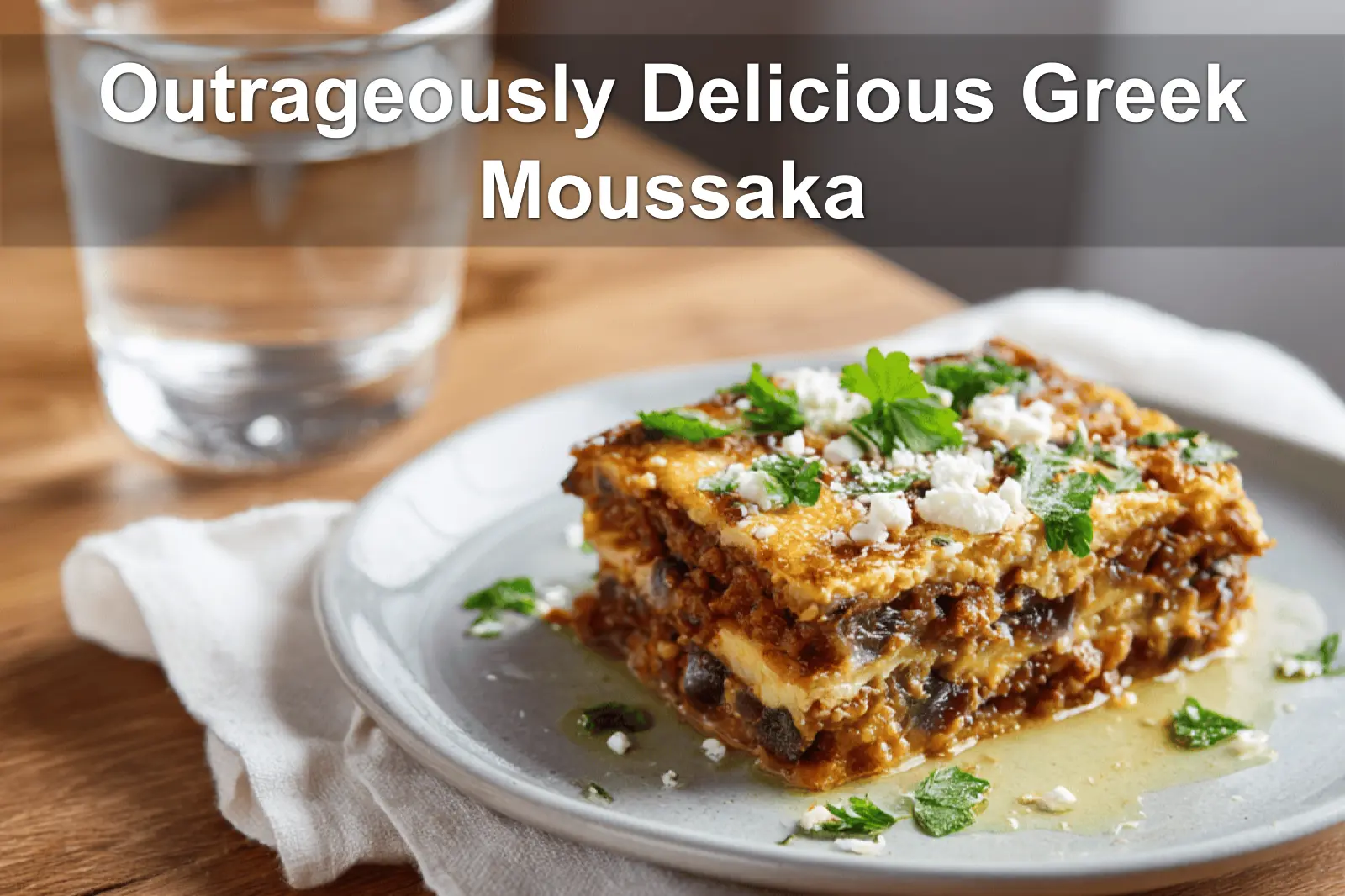 Outrageously Delicious Greek Moussaka with golden topping fresh herbs clean white napkin