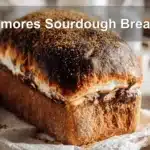 Freshly baked Smores Sourdough Bread showing gooey marshmallow and chocolate perfect for a blog feature.