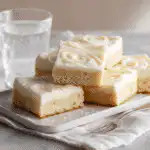 Final Sourdough Sugar Cookie Bars plated on white napkin with natural lighting and clean styling