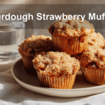 Sourdough Strawberry Muffins on a clean table with natural lighting and inviting decor