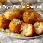 Air Fryer Potato Croquettes golden crispy croquettes with melted cheese and green onions