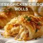 CHEESY CHICKEN CRESCENT ROLLS golden baked crescents with melted cheese and herb garnish