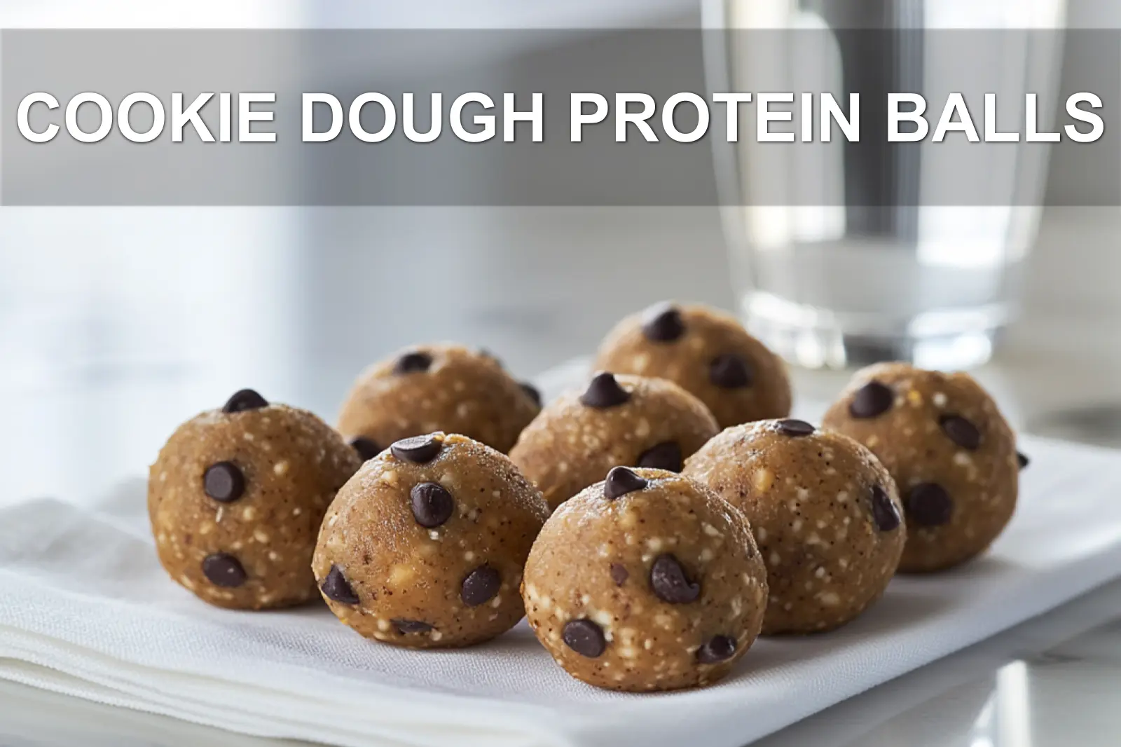COOKIE DOUGH PROTEIN BALLS single bowl on white cloth warm natural light shallow depth of field