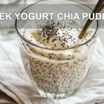 GREEK YOGURT CHIA PUDDING with mixed berries nuts and dark chocolate chips in a glass