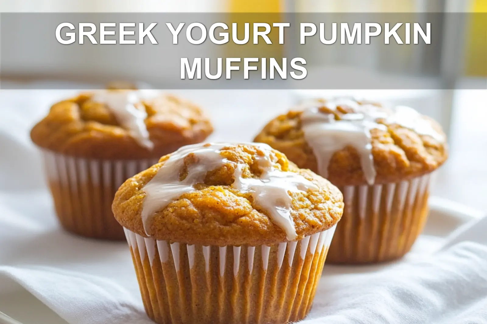 GREEK YOGURT PUMPKIN MUFFINS warm homemade muffins on white napkin with glass of water