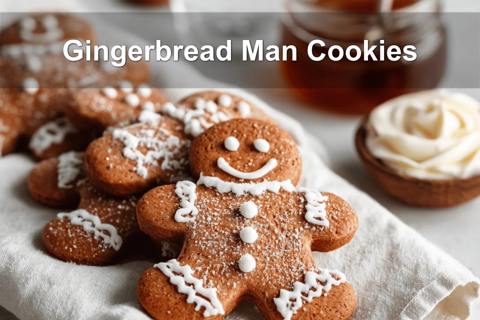 Gingerbread Man Cookies on white cloth with water glass warm festive close up