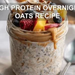 HIGH PROTEIN OVERNIGHT OATS RECIPE creamy jar with berries and coconut warm natural light