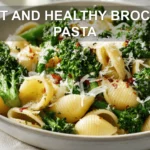LIGHT AND HEALTHY BROCCOLI PASTA plated with broccoli florets garlic and grated cheese warm natural light