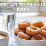 SWEET AIR FRYER CHURRO BITES close-up plated bites on white napkin with water glass