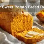 Tasty Sweet Potato Bread Recipe fresh loaf on white cloth with clear glass of water