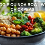 VEGGIE QUINOA BOWL WITH CHICKPEAS vibrant plated bowl with roasted chickpeas and vegetables