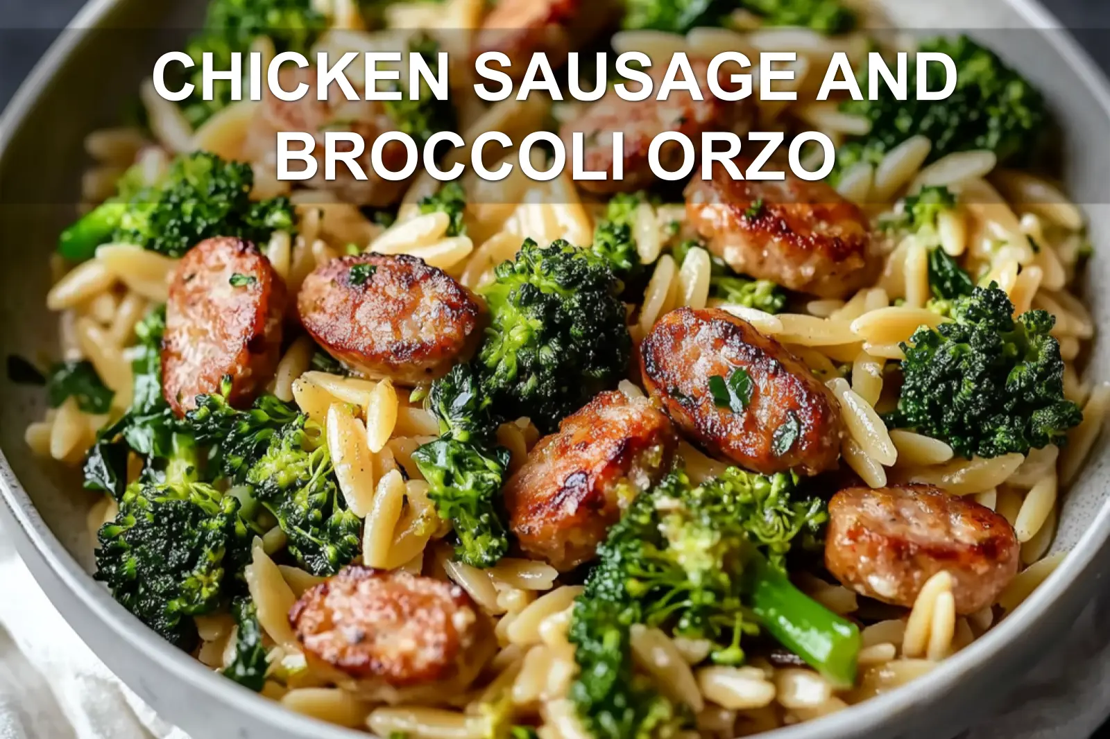 CHICKEN SAUSAGE AND BROCCOLI ORZO plated, warm natural light, white cloth, shallow depth of field