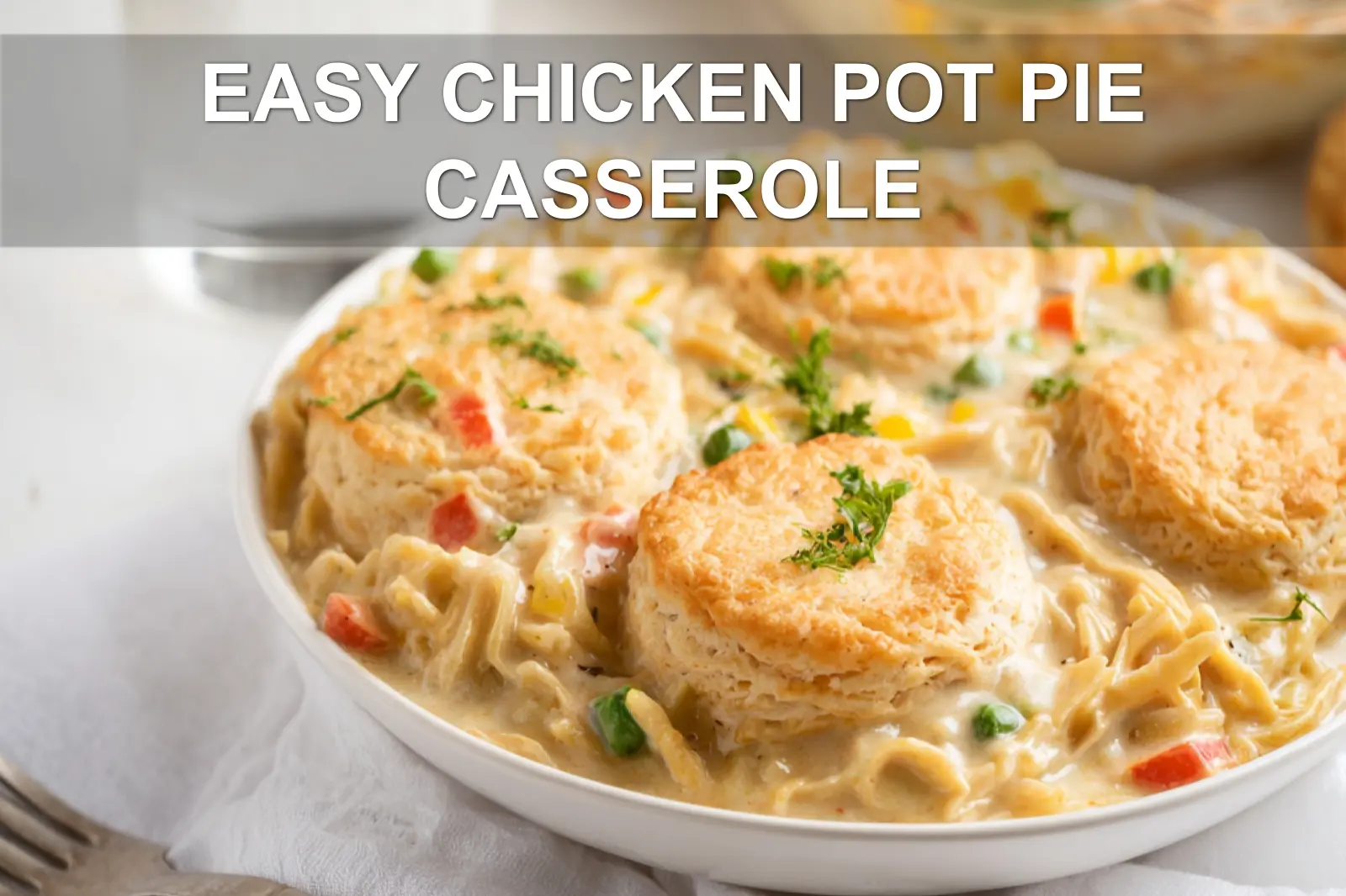 EASY CHICKEN POT PIE CASSEROLE warm golden biscuits bubbling creamy filling close up