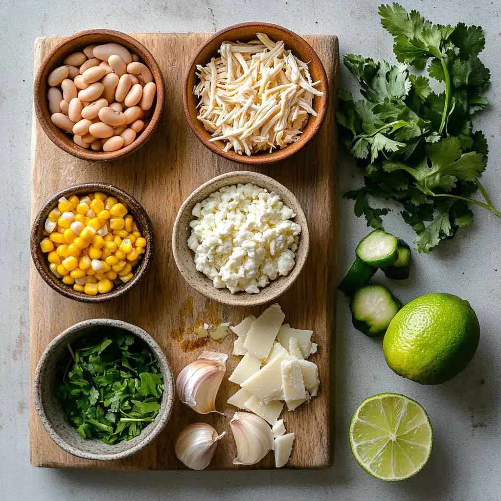 Pioneer Woman White Chicken Chili: Irresistible Easy Recipe 4 Ingredients for Pioneer Woman White Chicken Chili lined up on a wooden table