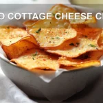 KETO COTTAGE CHEESE CHIPS crunchy chips with paprika and fresh herbs on white napkin