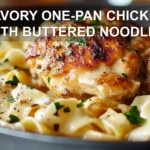 SAVORY ONE-PAN CHICKEN WITH BUTTERED NOODLES plated with egg noodles herbs butter warm glow