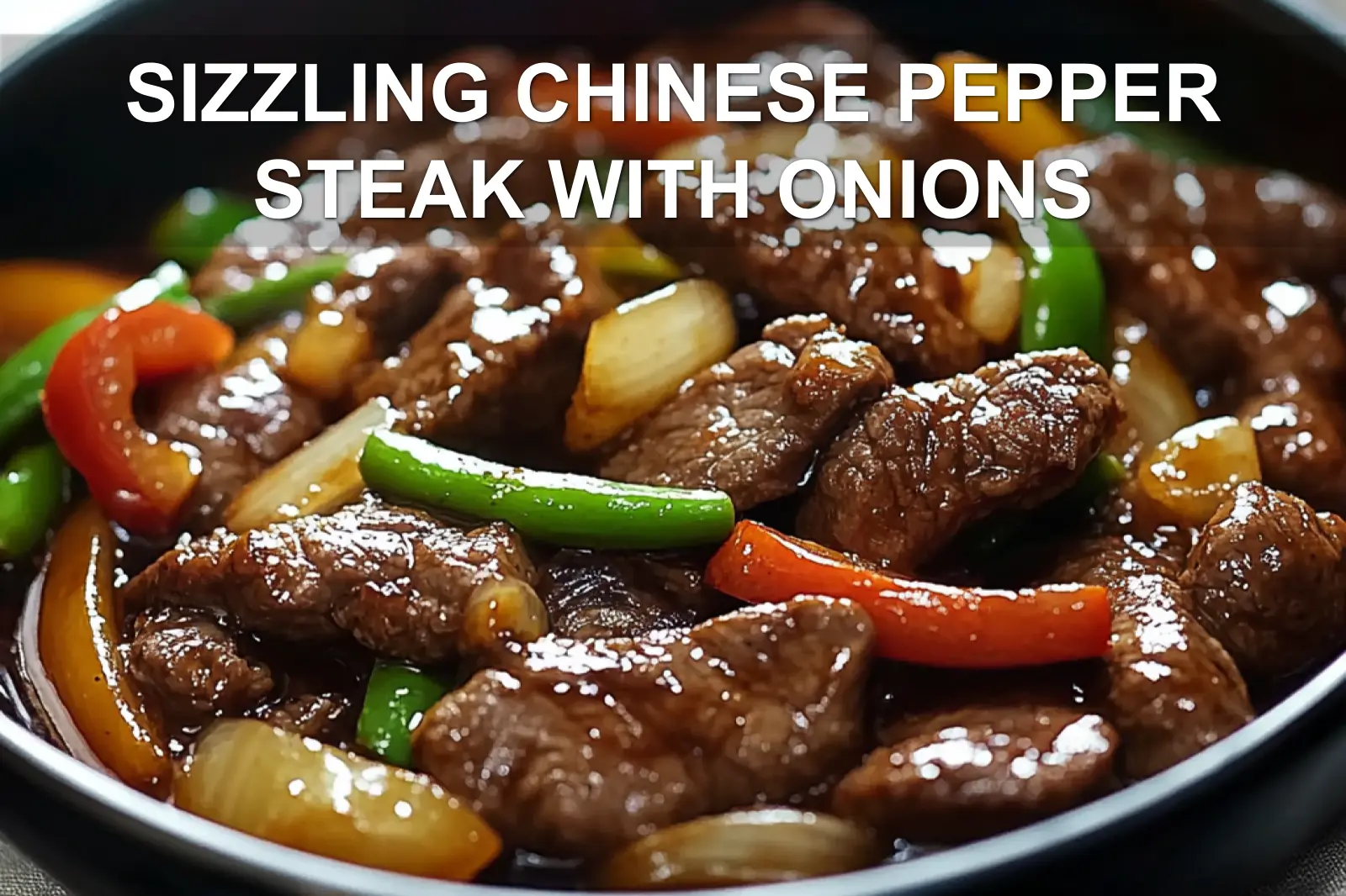 SIZZLING CHINESE PEPPER STEAK WITH ONIONS served with steamed rice green onions vibrant peppers