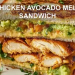 CHICKEN AVOCADO MELT SANDWICH centered hero view, clean and uncluttered