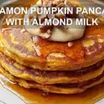 CINNAMON PUMPKIN PANCAKES WITH ALMOND MILK centered hero view, clean and uncluttered