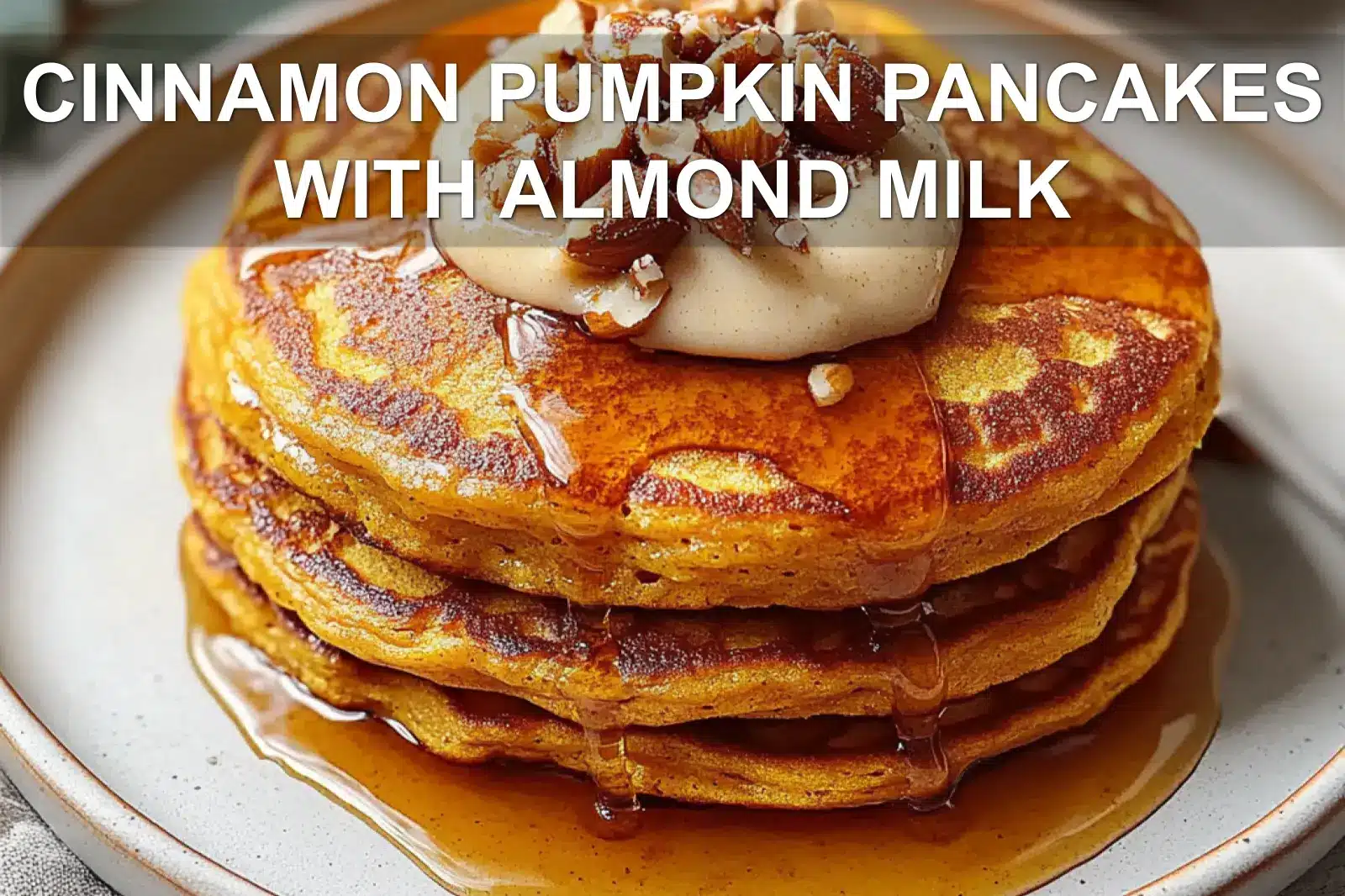 CINNAMON PUMPKIN PANCAKES WITH ALMOND MILK centered hero view, clean and uncluttered
