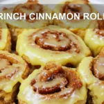 GRINCH CINNAMON ROLLS centered hero view, clean and uncluttered