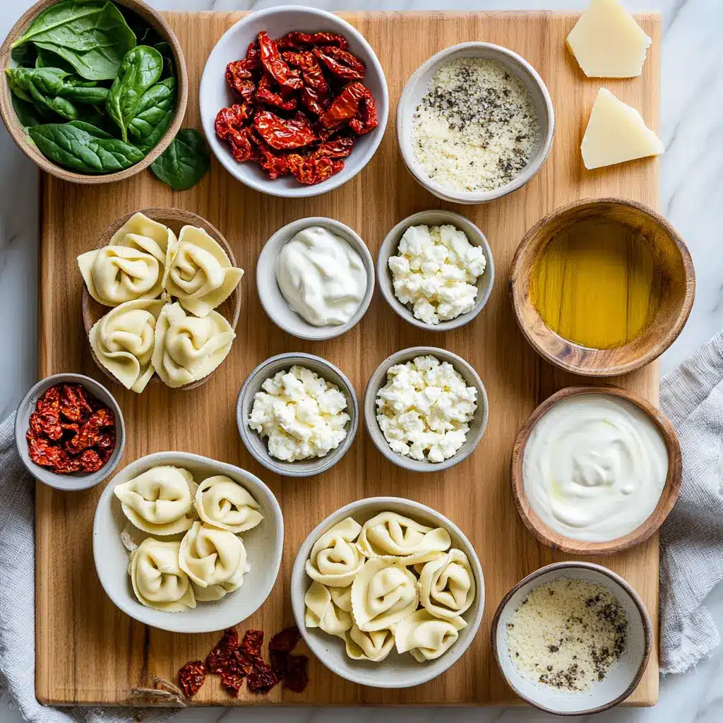 Marry Me Tortellini Recipe Quick and Irresistible 4 Assortment of fresh ingredients for Marry Me Tortellini, including fresh tortellini, sun-dried tomatoes, spinach, garlic, and cream.