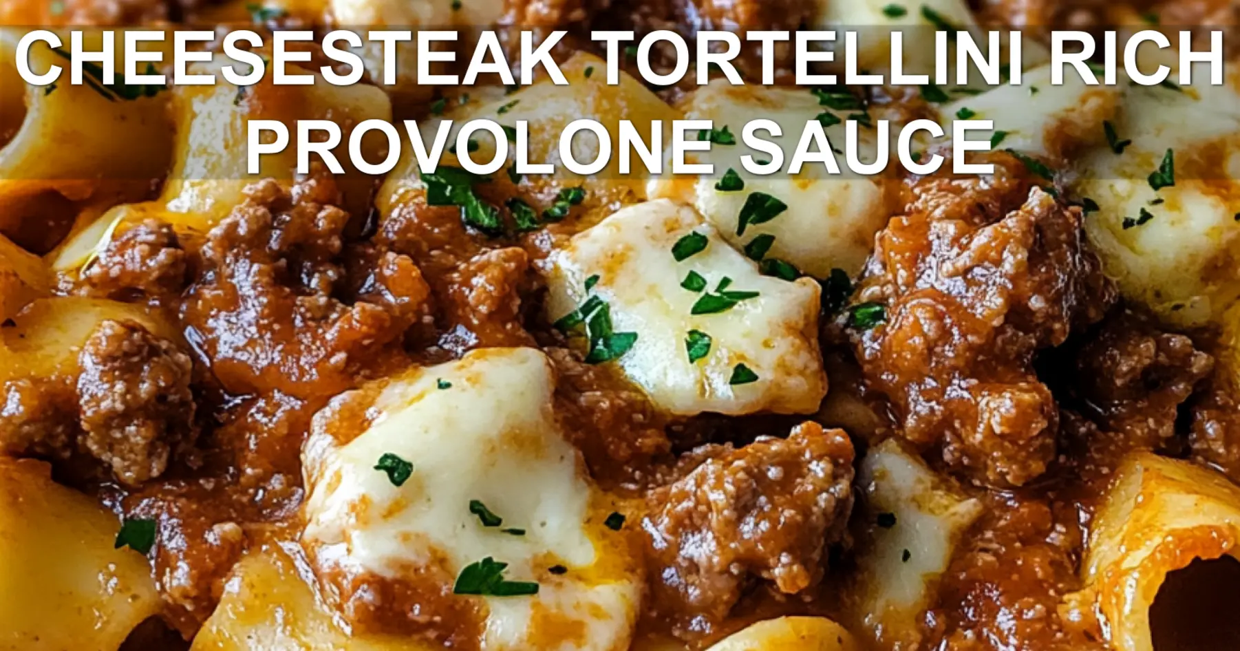 CHEESESTEAK TORTELLINI RICH PROVOLONE SAUCE centered hero view, clean and uncluttered