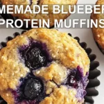 HOMEMADE BLUEBERRY PROTEIN MUFFINS centered hero view, clean and uncluttered