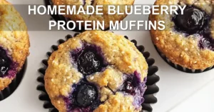 Homemade Blueberry Protein Muffins: Simple and Delicious HOMEMADE BLUEBERRY PROTEIN MUFFINS centered hero view, clean and uncluttered