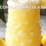 NON ALCOHOLIC PIÑA COLADA PUNCH centered hero view, clean and uncluttered