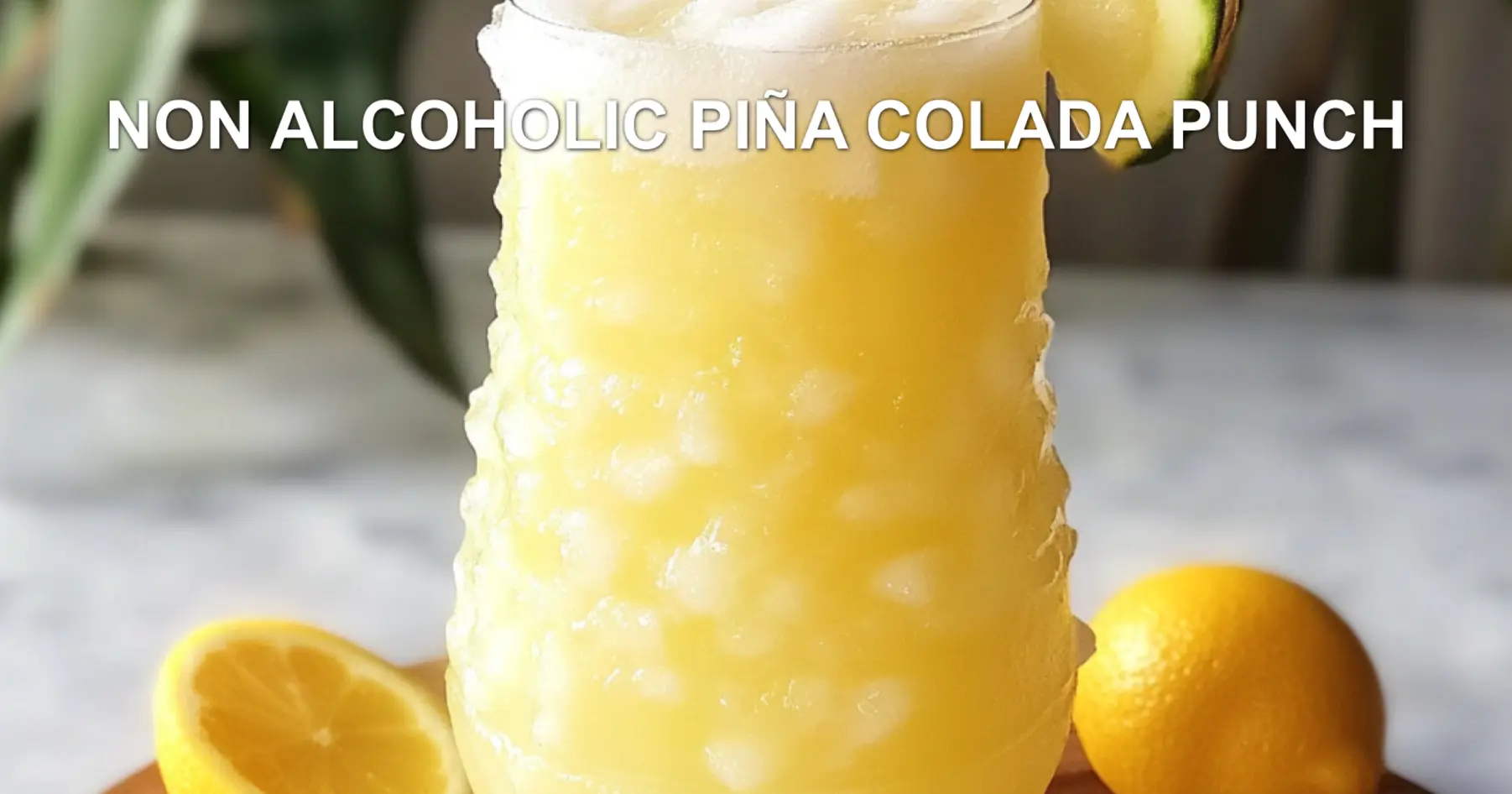 NON ALCOHOLIC PIÑA COLADA PUNCH centered hero view, clean and uncluttered