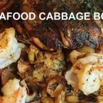 SEAFOOD CABBAGE BOIL centered hero view, clean and uncluttered